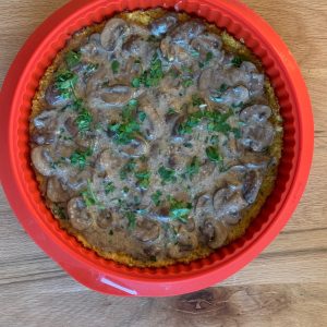 Mushrooms pie with cauliflower crust.