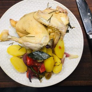 Boiled chicken with bell peppers and potatoes.